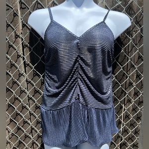 Beautifully designed metallic blue blouse. Very light material.